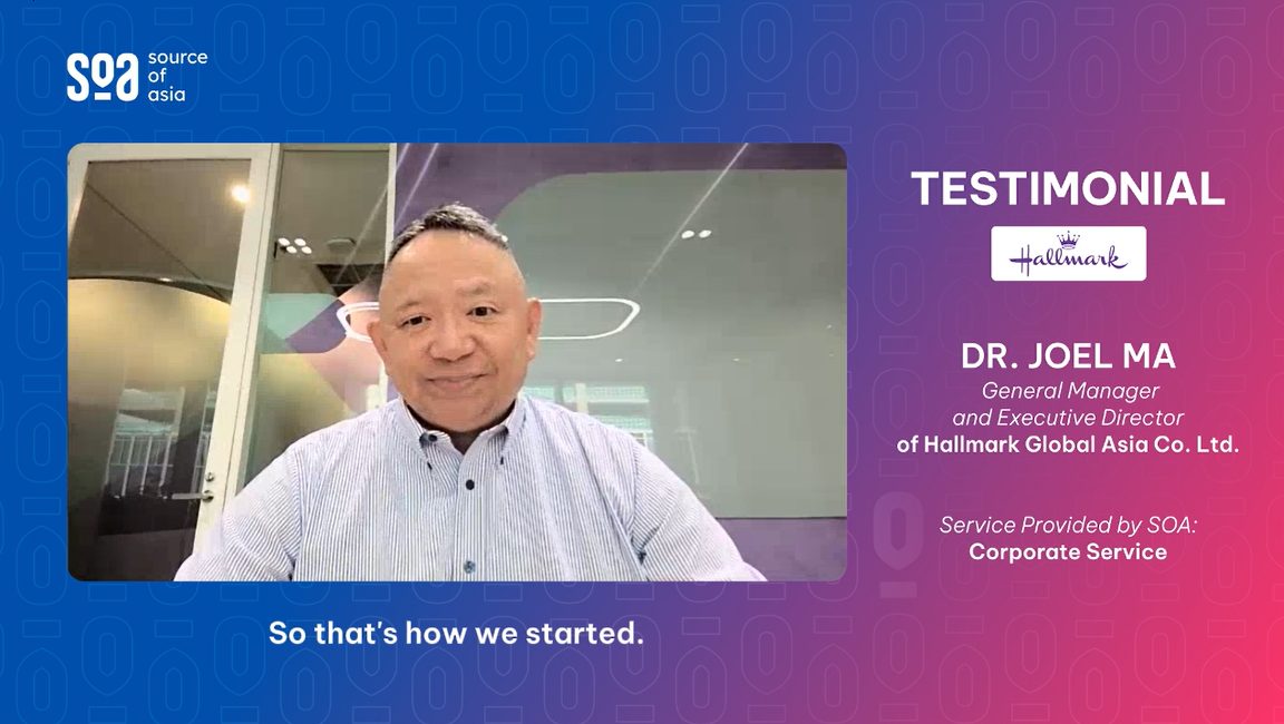 Client testimonial video frame featuring Dr. Joel Ma, General Manager and Executive Director of Hallmark Global Asia, sharing Hallmark’s experience working with Source of Asia for business incubation services